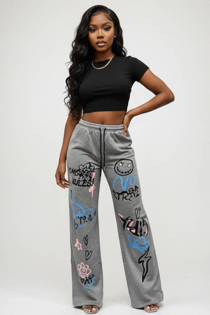 GRAFFITI PRINT SWEATPANTS